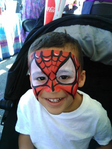 Spiderman Face Painting on a Boy
